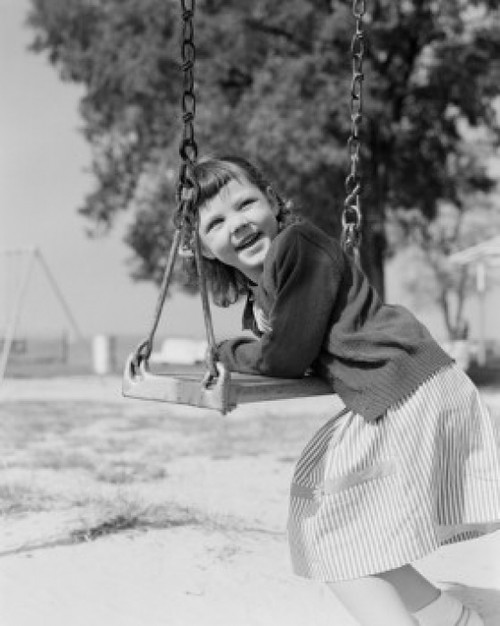 Girl swinging and laughing Poster Print - Item # VARSAL255416549