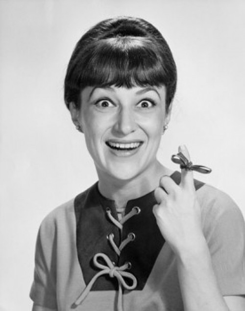 Portrait of a mid adult woman showing a ribbon tied on her finger Poster Print - Item # VARSAL25510568B