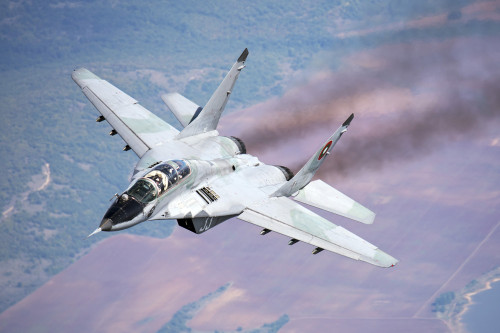 A Bulgarian Air Force MiG-29s during a training mission over Graf Ignatievo Air Base, Bulgaria Poster Print - Item # VARPSTDFC100097M