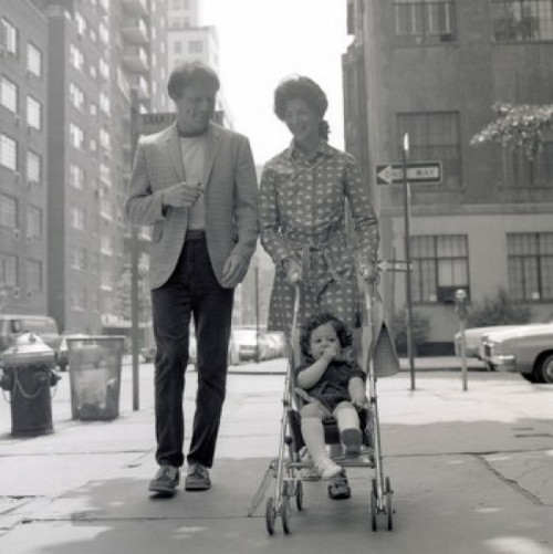 Mother  father and baby boy on  sidewalk Poster Print - Item # VARSAL2559764