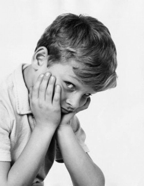 Close-up of a boy looking sad Poster Print - Item # VARSAL25513367