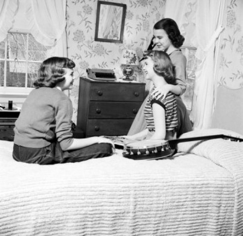 Three girls sitting on bed and talking Poster Print - Item # VARSAL2555093