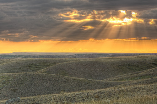 Rays Of Sunset Light Between The Clouds, Grasslands National Park, Saskatchewan PosterPrint - Item # VARDPI2039156