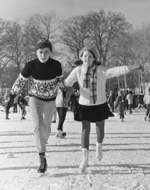 Teenage boy and teenage girl ice skating and holding hands Poster Print - Item # VARSAL2555000A