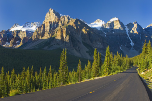 View Of Glacial Mountains And Trees Along The Road To Lake Moraine In Banff National Park; Alberta Canada PosterPrint - Item # VARDPI1941802
