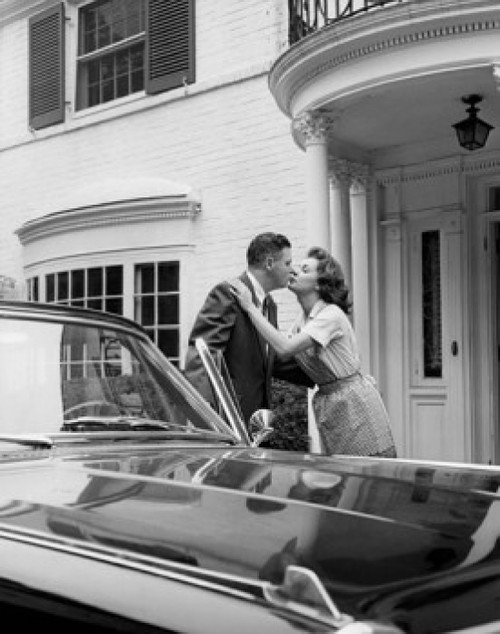 Young couple kissing each other Poster Print - Item # VARSAL25522431