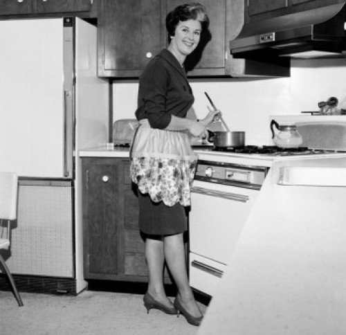 Mature housewife cooking Poster Print - Item # VARSAL255417729