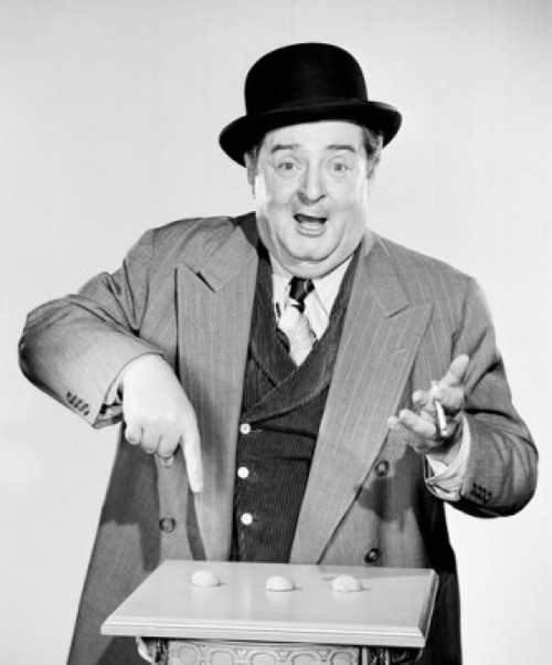 Portrait of a man pointing to nutshells Poster Print - Item # VARSAL2558062