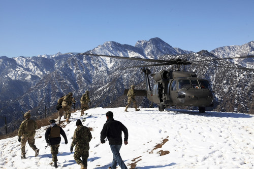February 8, 2012 - U.S. soldiers and Afghan National Army soldiers prepare to board a U.S. Army UH-60 Black Hawk helicopter at Observation Post Mangol in the Nari district, Kunar province, Afghanistan Poster Print - Item # VARPSTSTK105400M