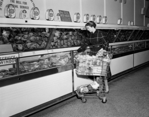 Young woman in supermarket Poster Print - Item # VARSAL255416838