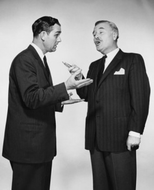 Two businessmen talking to each other Poster Print - Item # VARSAL25541659