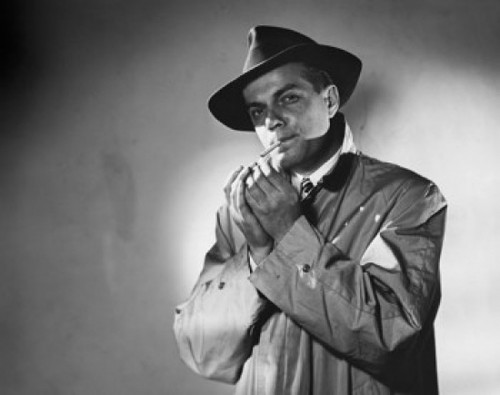 Portrait of a mid adult man smoking a cigarette Poster Print - Item # VARSAL25547708