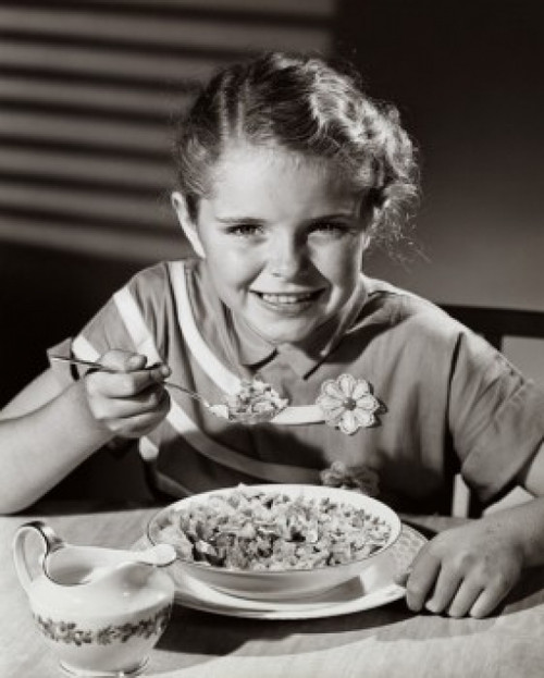 Portrait of a girl having breakfast Poster Print - Item # VARSAL2553304 Portrait of a girl having breakfast Poster Print - Item # VARSAL2553304