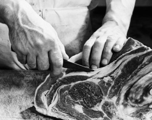 Mid section view of a man's hands cutting raw meat Poster Print - Item # VARSAL25536981