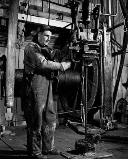 Side profile of a manual worker drilling for natural gas Poster Print - Item # VARSAL25523425