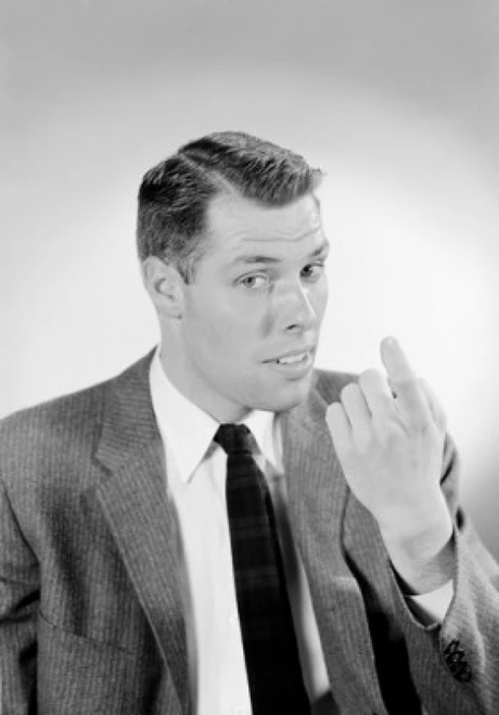 Portrait of young man gesturing Poster Print