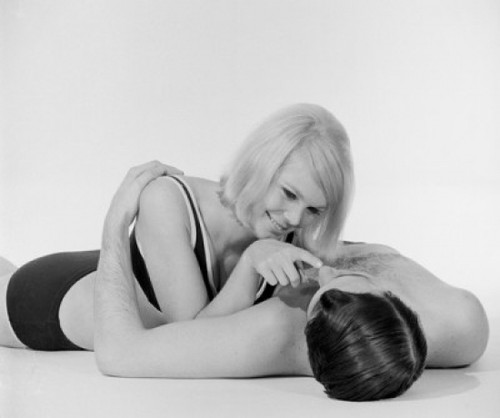 Young semi-dress couple lying on floor Poster Print - Item # VARSAL255417824