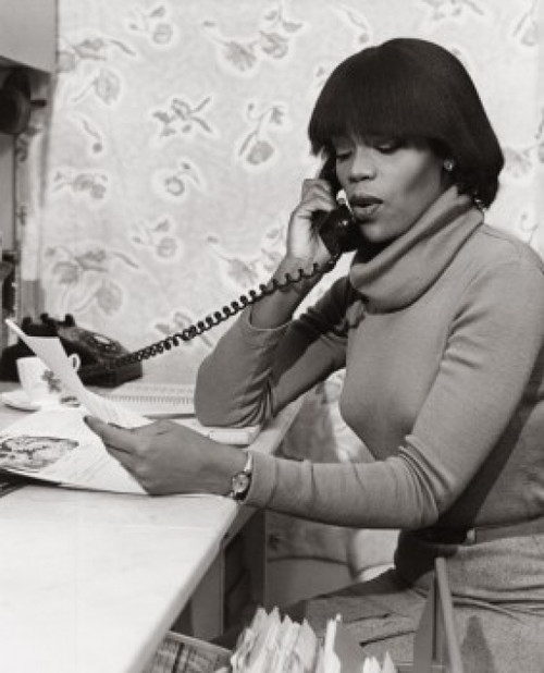 Young woman talking on the telephone Poster Print - Item # VARSAL2558739