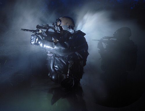 Special Operations Forces combat divers transit the waters armed with Steyr AUG assault rifles Poster Print - Item # VARPSTTWE300042M