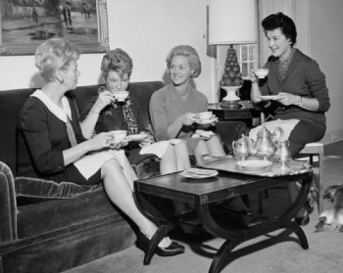 Four young women sitting together drinking tea Poster Print - Item # VARSAL25542605