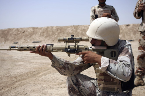 June 23, 2006 - Iraqi Army Sergeant sights in down range during an advanced marksmanship course aboard Camp Fallujah, Iraq. Poster Print - Item # VARPSTSTK102160M
