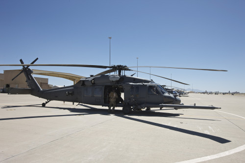 HH-60G Pave Hawk with pararescuemen at Davis-Monthan Air Force Base, Arizona, during exercise Angel Thunder 2013 Poster Print - Item # VARPSTTMO101106M