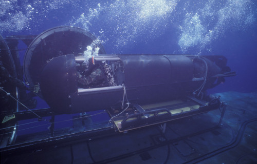 The SEAL Delivery Vehicle pilot lands the SDV on the Dry Deck Shelter track and cradle system while rigged out on the deck of the submarine USS Kamehameha off the coast of Oahu, Hawaii Poster Print - Item # VARPSTWOD100151M