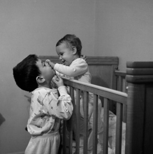 Baby sister playing with brother Poster Print - Item # VARSAL25516680