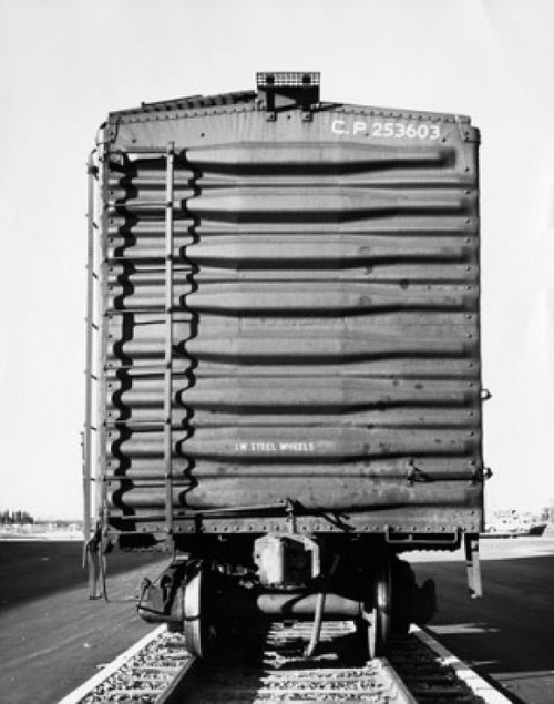 Freight train on a railroad track Poster Print