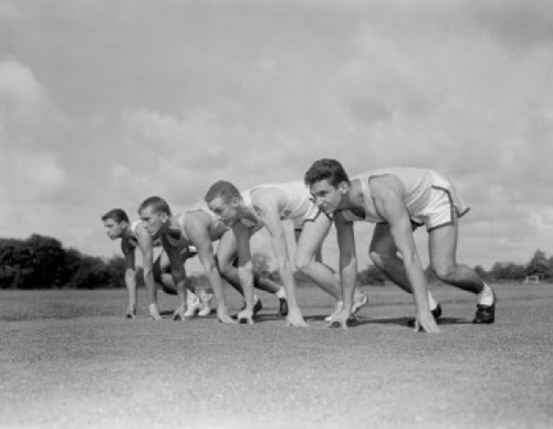 Men preparing to run Poster Print
