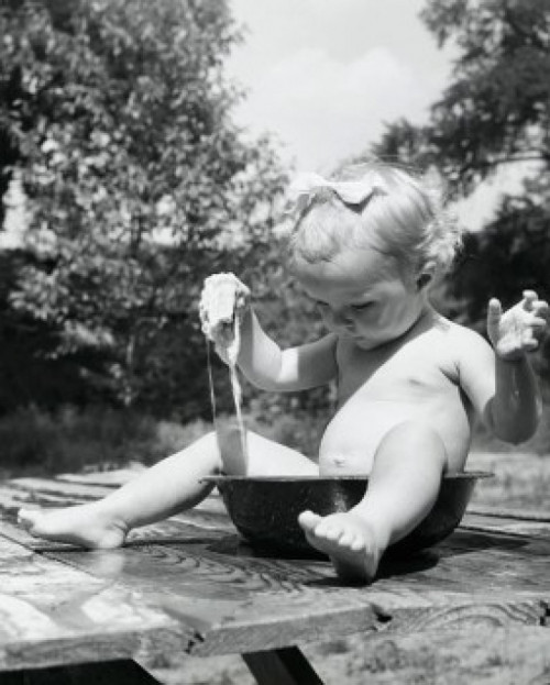 Baby girl sitting in bowl Poster Print - Item # VARSAL2559173