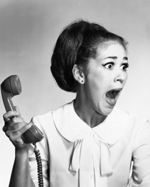 Close-up of a young woman holding a telephone receiver and shouting Poster Print - Item # VARSAL2556449A