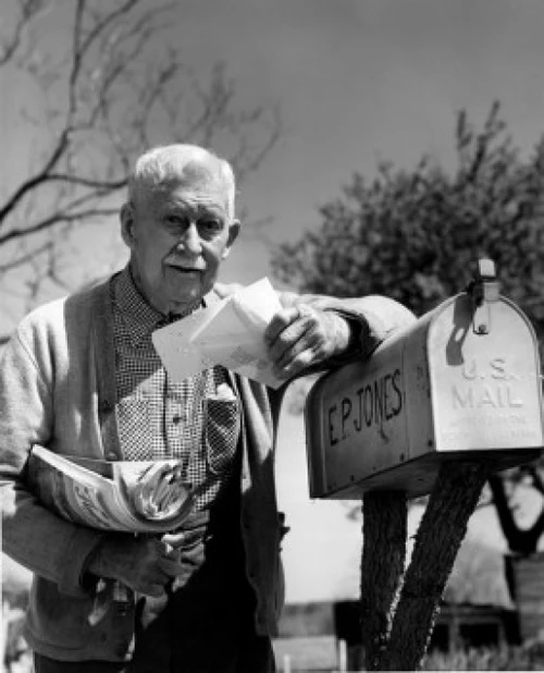 Senior man taking out correspondence from mailbox Poster Print - Item # VARSAL25534886