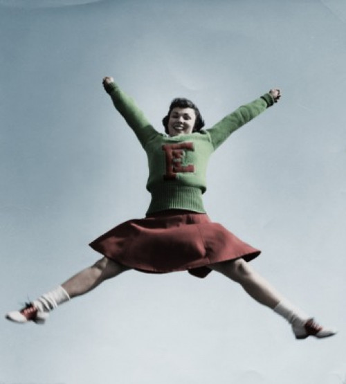 Female cheerleader jumping in air Poster Print - Item # VARSAL2559518A