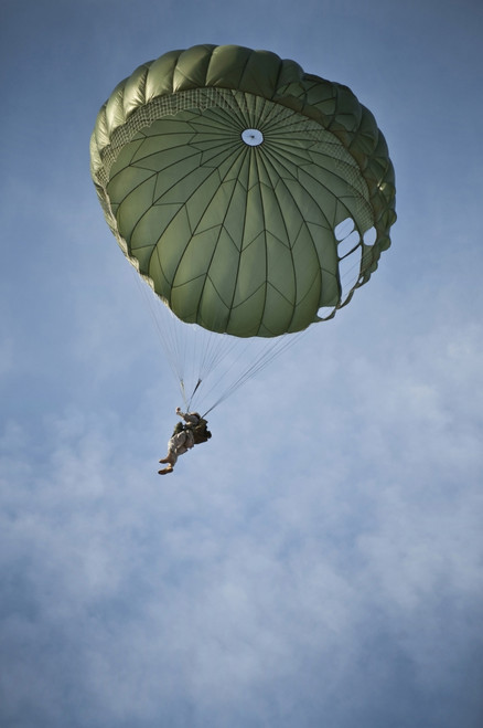 April 15, 2011 - An Airman descends after a static-line jump from a CH-47 Chinook helicopter as part of airdrop and sling-load training at Nellis Air Force Base, Nevada Poster Print - Item # VARPSTSTK104682M April 15, 2011 - An Airman descends after a static-line jump from a CH-47 Chinook helicopter as part of airdrop and sling-load training at Nellis Air Force Base, Nevada Poster Print - Item # VARPSTSTK104682M