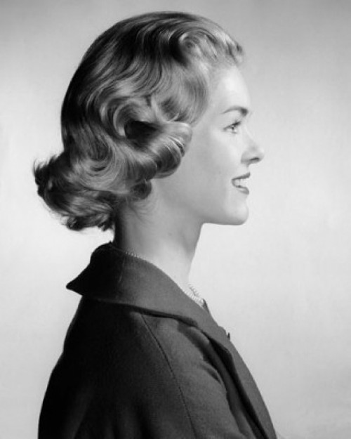 Side profile of a young woman smiling Poster Print - Item # VARSAL25510869