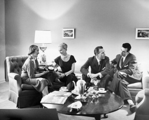 Two young men and two young women talking to each other Poster Print - Item # VARSAL25538045B