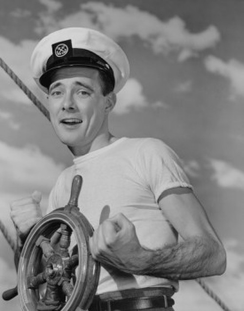 Portrait of sailor steering ship Poster Print - Item # VARSAL255422960