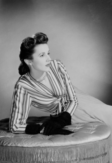 Portrait of elegant young woman leaning on Poster Print - Item # VARSAL255418904