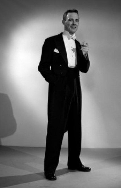 Elegant young man holding cigarette Poster Print - Item # VARSAL25518463