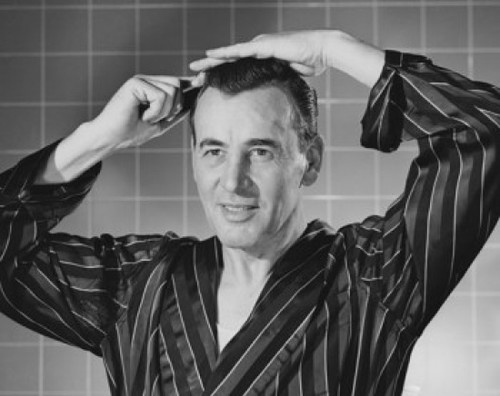 Mature man combing his hair Poster Print - Item # VARSAL25528171