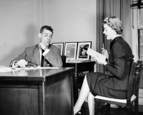 Businessman looking at the legs of his secretary sitting beside him Poster Print - Item # VARSAL25544262