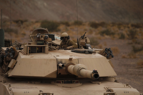 December 1, 2011 - Soldier looks out the main hatch of his team_?_s tank during a patrol exercise in the Combat Center_?_s training area Poster Print - Item # VARPSTSTK105284M