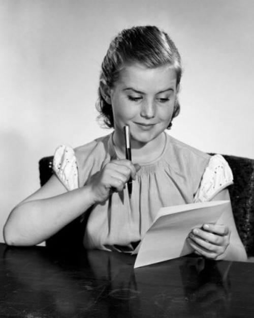 Young woman at table writing letter Poster Print - Item # VARSAL25514344