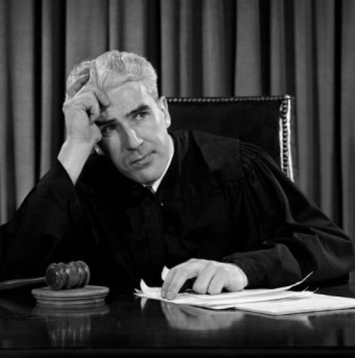 Judge sitting behind desk Poster Print - Item # VARSAL25528253