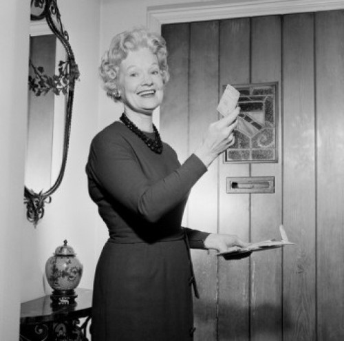 Senior woman opening and reading letter Poster Print - Item # VARSAL255422442B