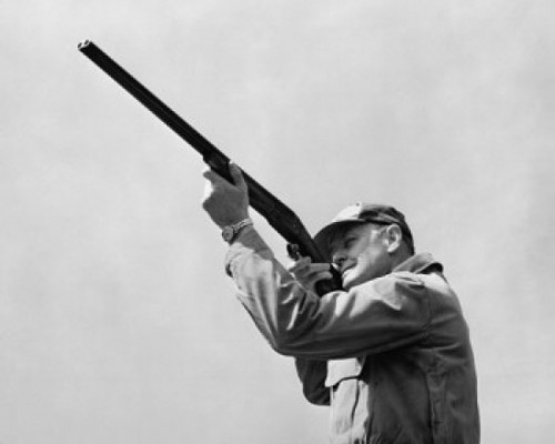 Hunter shooting with a rifle Poster Print - Item # VARSAL25524428