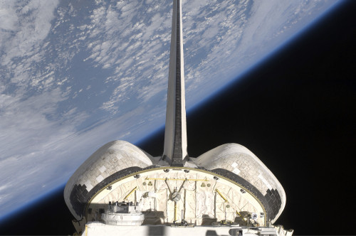 A partial view of Space Shuttle Endeavour backdropped by Earth's horizon Poster Print - Item # VARPSTSTK202950S