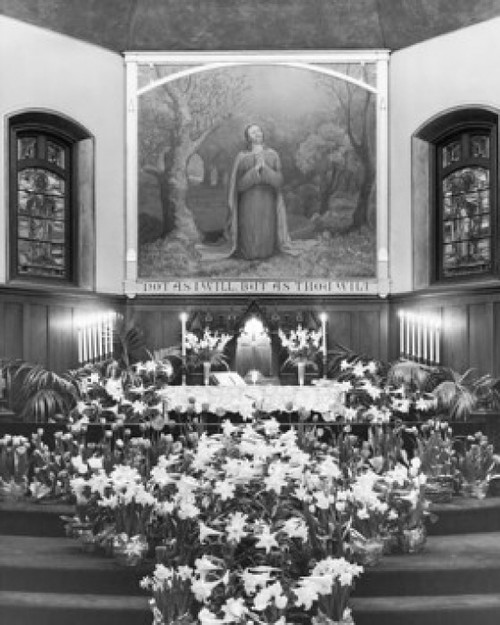 Easter Lilies and burning candles in a church Poster Print - Item # VARSAL25539928