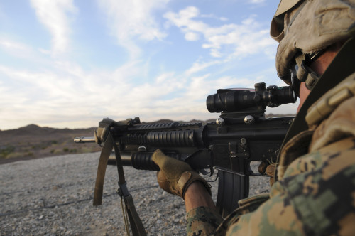 October 18, 2009 - A police sergeant sights in to fire on a target during infantry tactics training at Graze Range at the U.S. Army Yuma Proving Ground in Arizona. Poster Print - Item # VARPSTSTK103988M